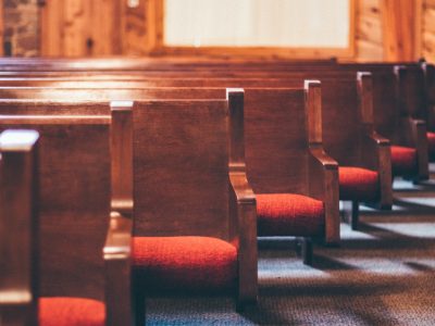 lined brown pew benches