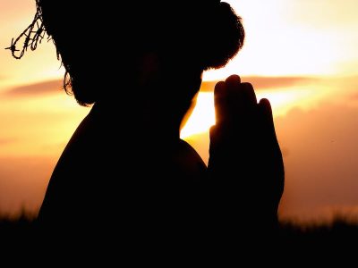 Silhouette Image of Person Praying